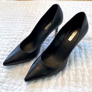 Guess size 8 black leather heals are the perfect height and in great shape.